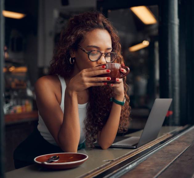 coffee-shop-laptop-and-black-woman-with-remote-work-for-copywriting-website-marketing-or-working-e1674230563284